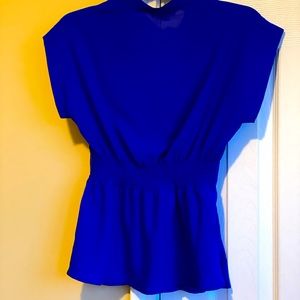 Blue shirt sleeved peplum top